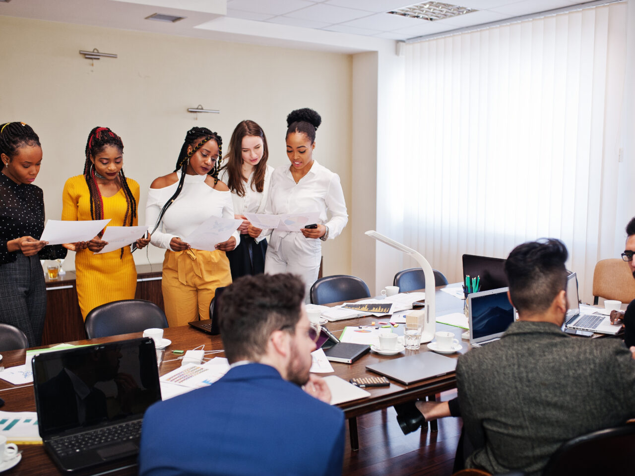 Diverse business people on a meeting at round table.